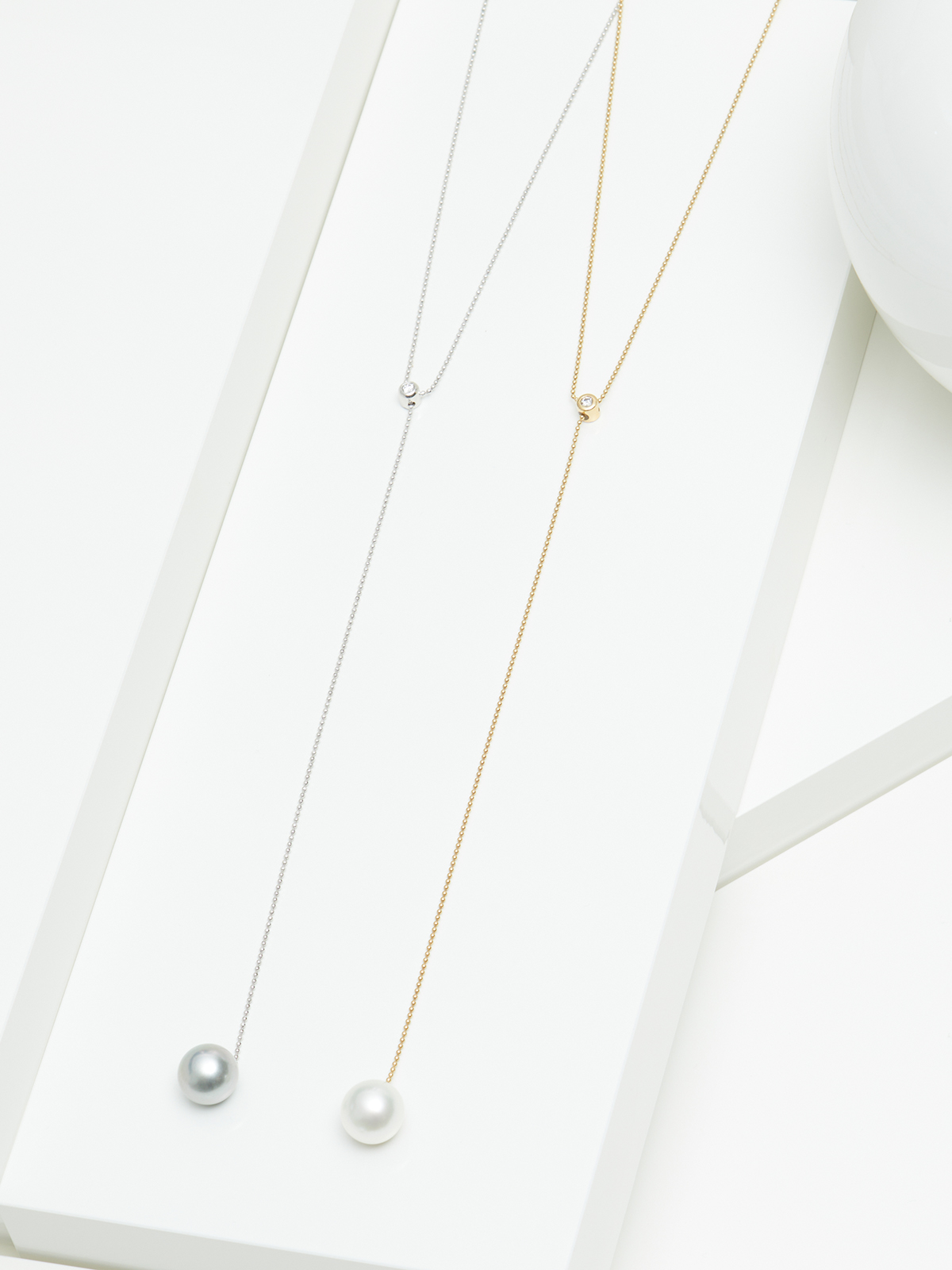 Y-necklace in yellow gold with diamond and Freshwater pearl