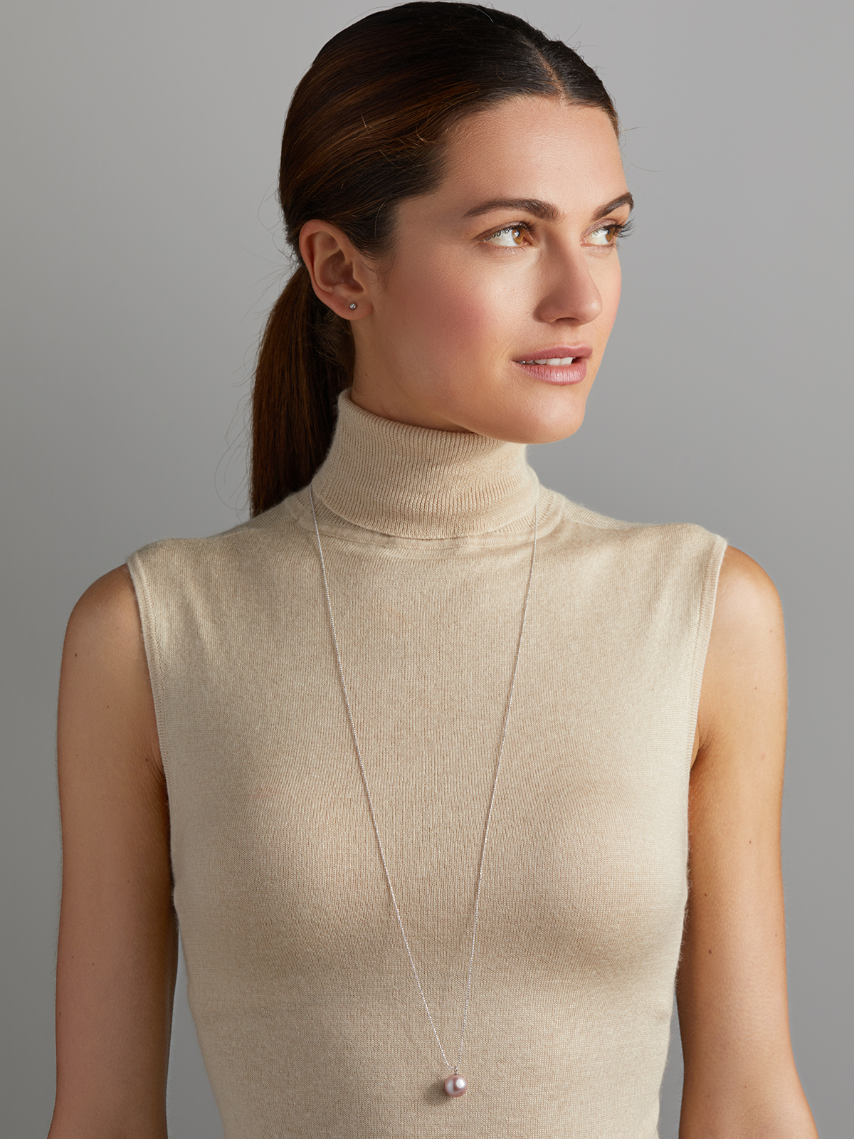 Long pearl necklace with large rose-coloured Freshwater pearl pendant
