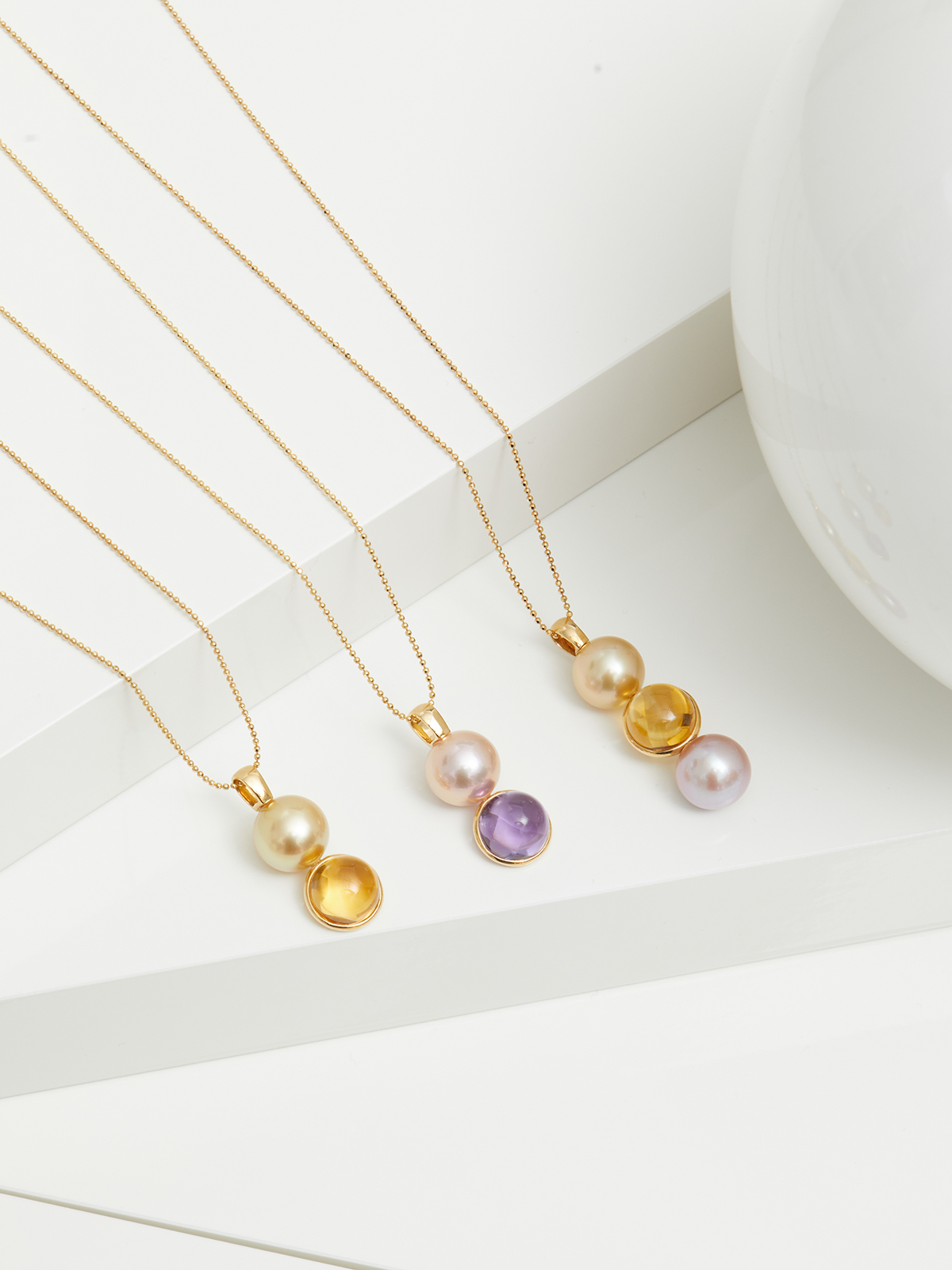 Gelbgoldkette mit Anhänger aus Süßwasserperle und Amethyst