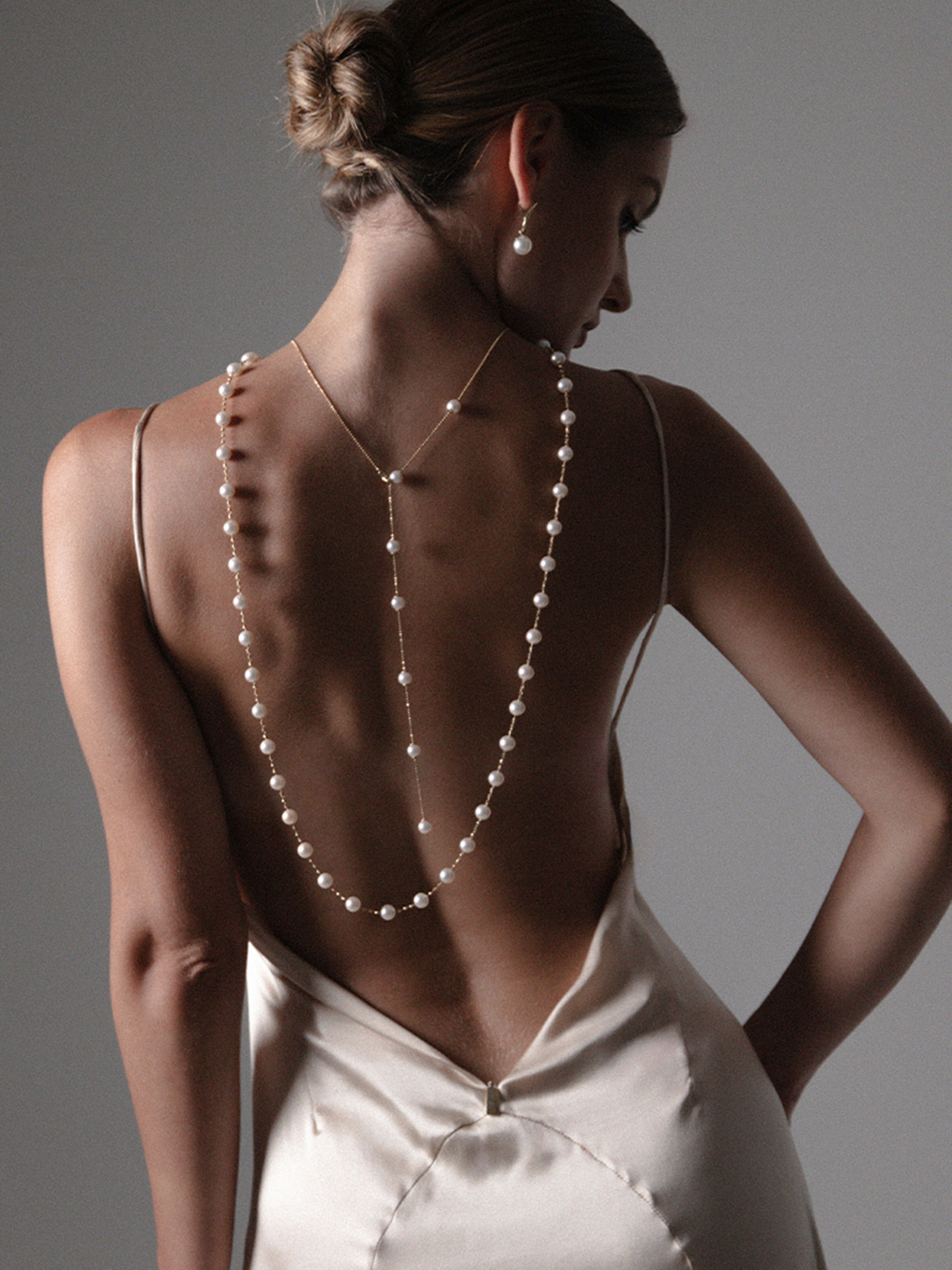 Transformable pearl necklace in yellow gold with Akoya pearls Transformable pearl necklace in yellow gold with Akoya pearls