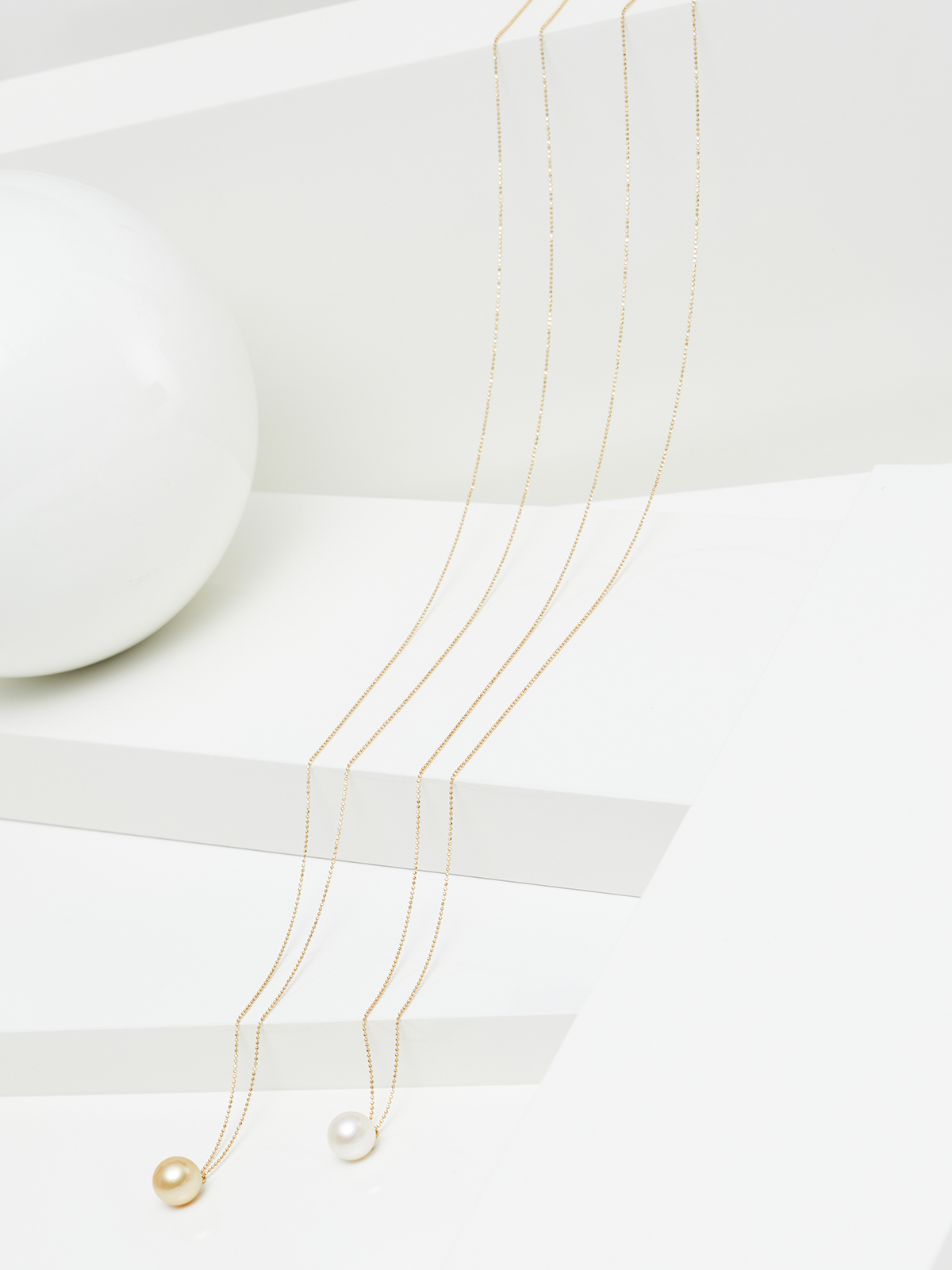 SD145-7__00383 Long pearl necklace with golden South Sea pearl pendant