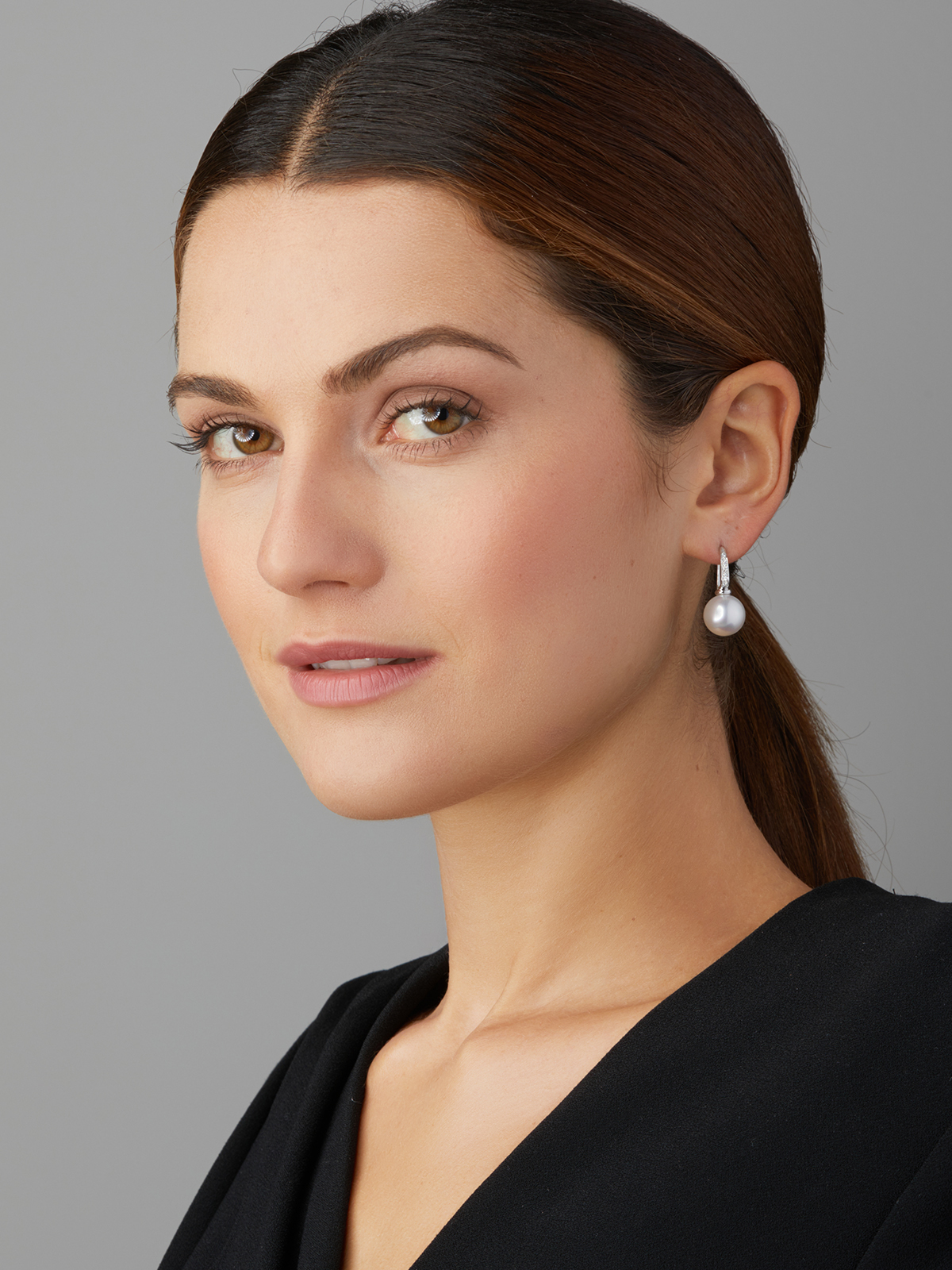 White gold ear hooks with diamonds and South Sea pearls