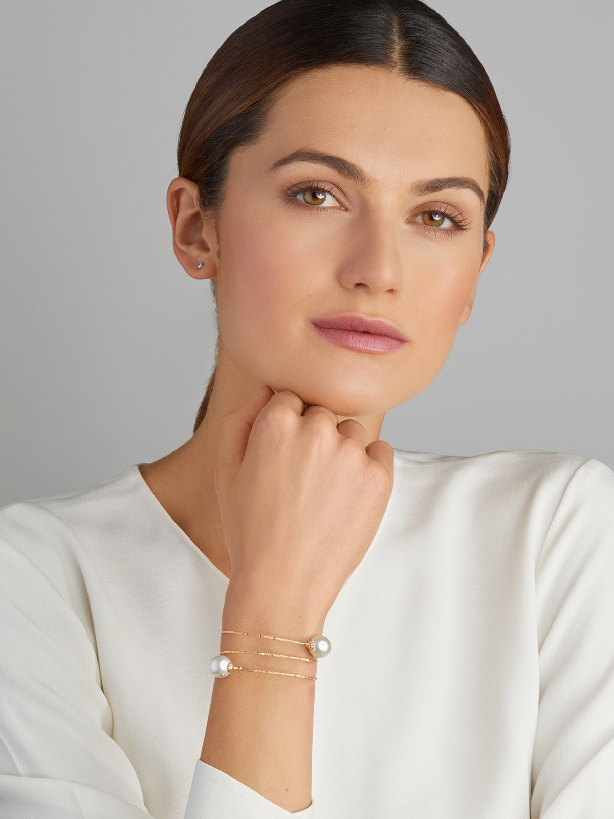 Armband in Gelbgold mit weißen Südseeperlen