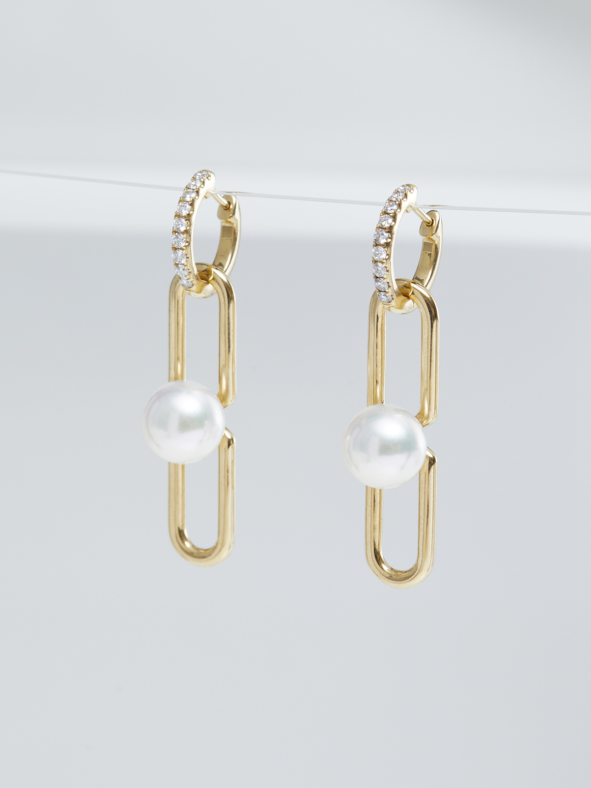 Versatile diamond earrings with pearl pendants