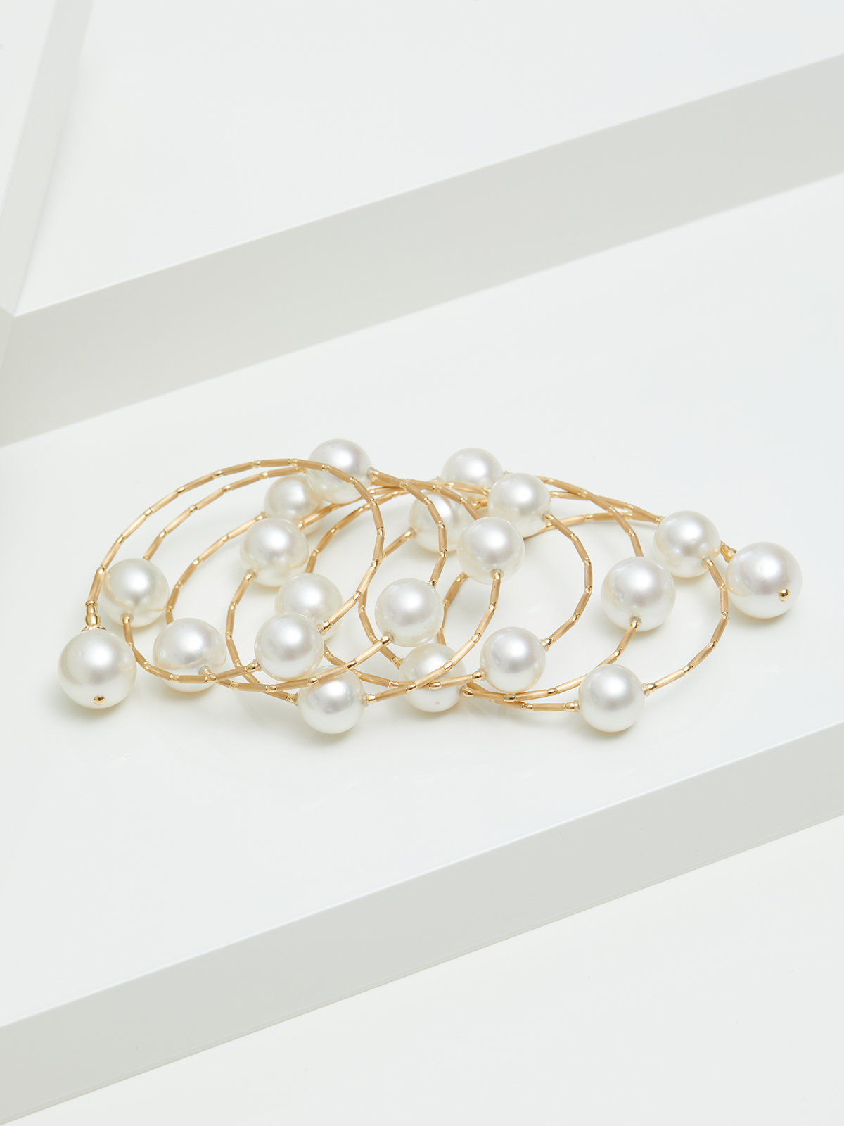 SD94-7__00066 Langes Wickelarmband in Gelbgold mit echten Südseeperlen