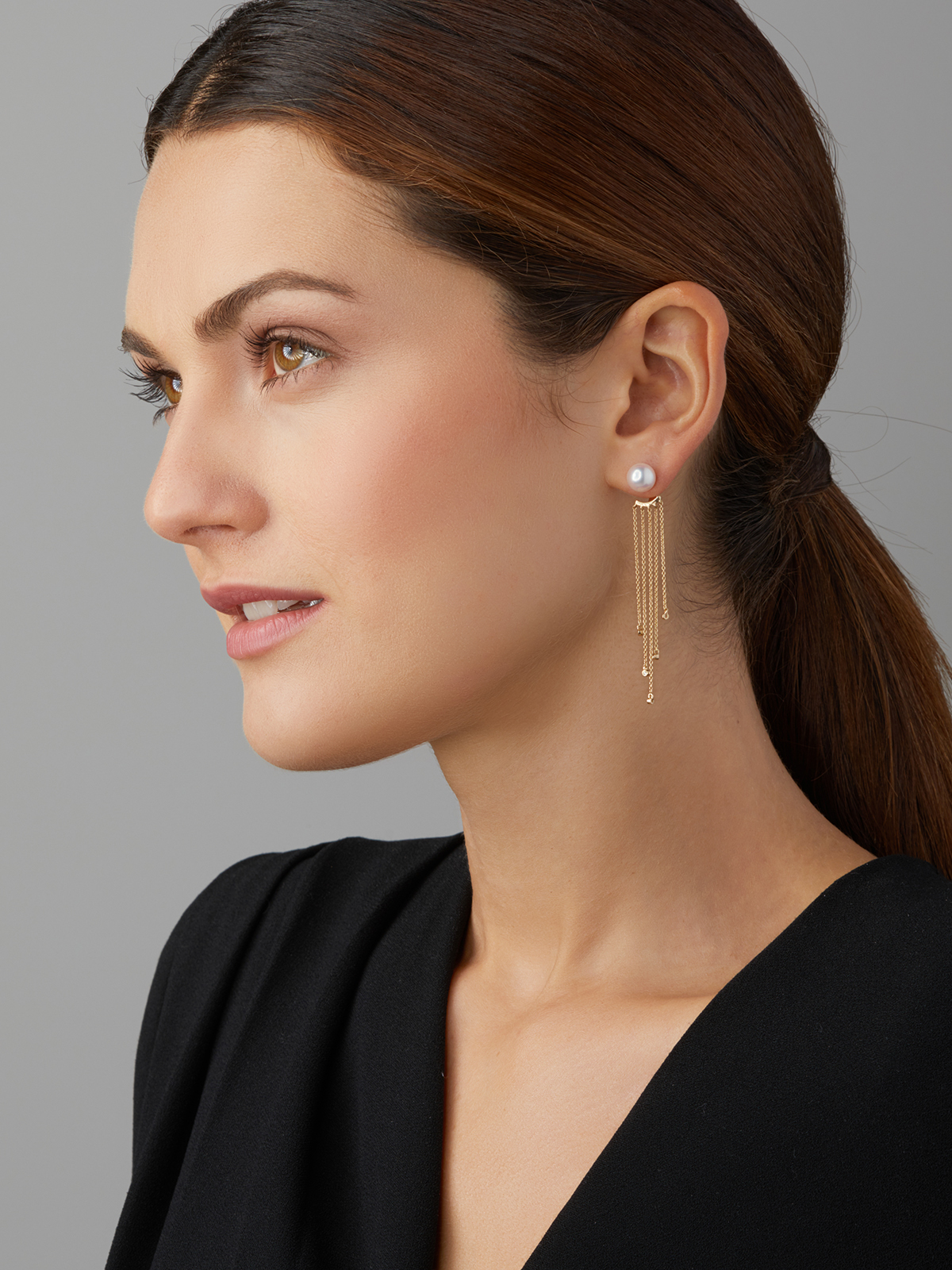 Opulent pearl earrings with diamonds