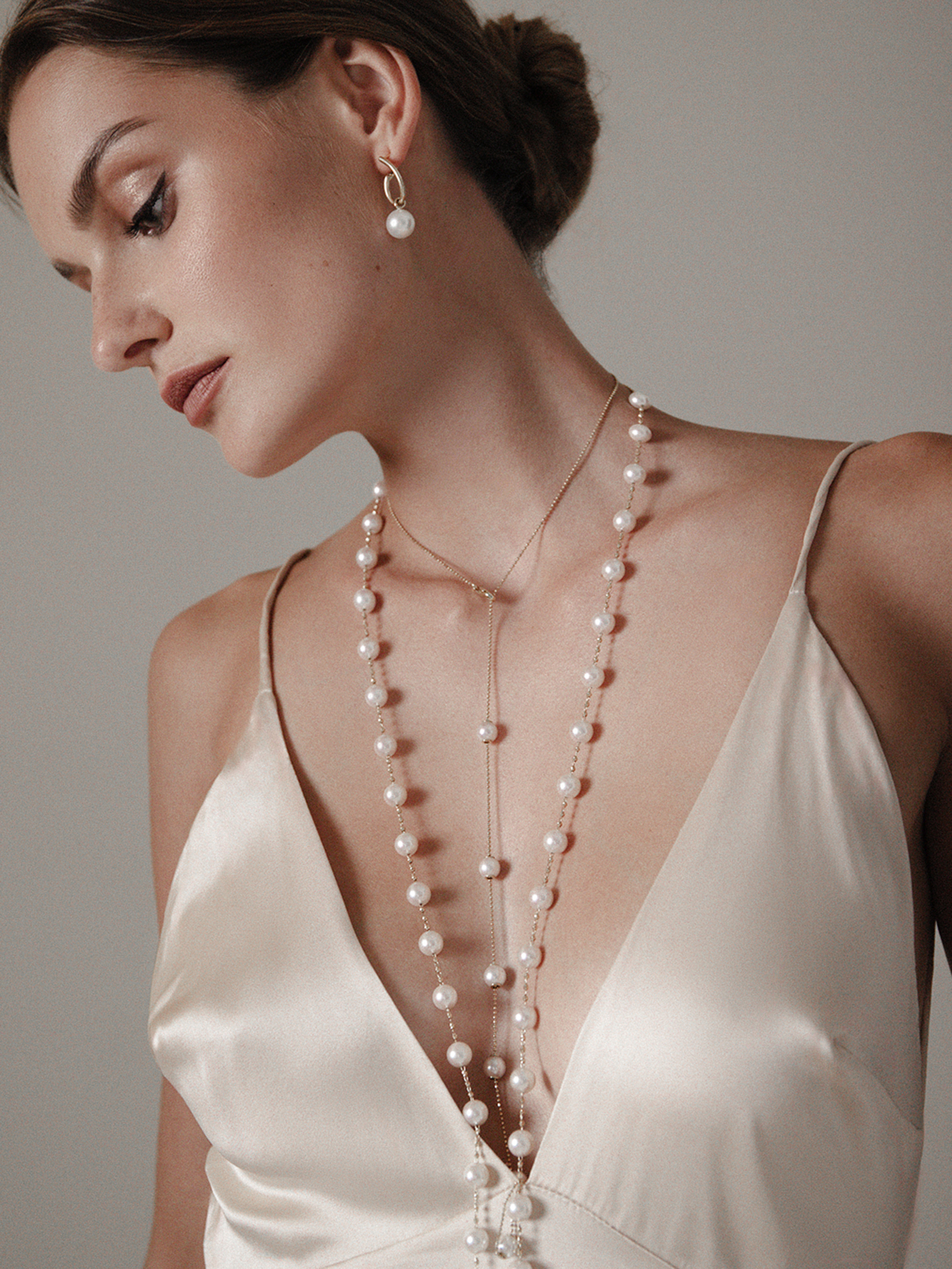 Transformable pearl necklace in yellow gold with Akoya pearls Transformable pearl necklace in yellow gold with Akoya pearls