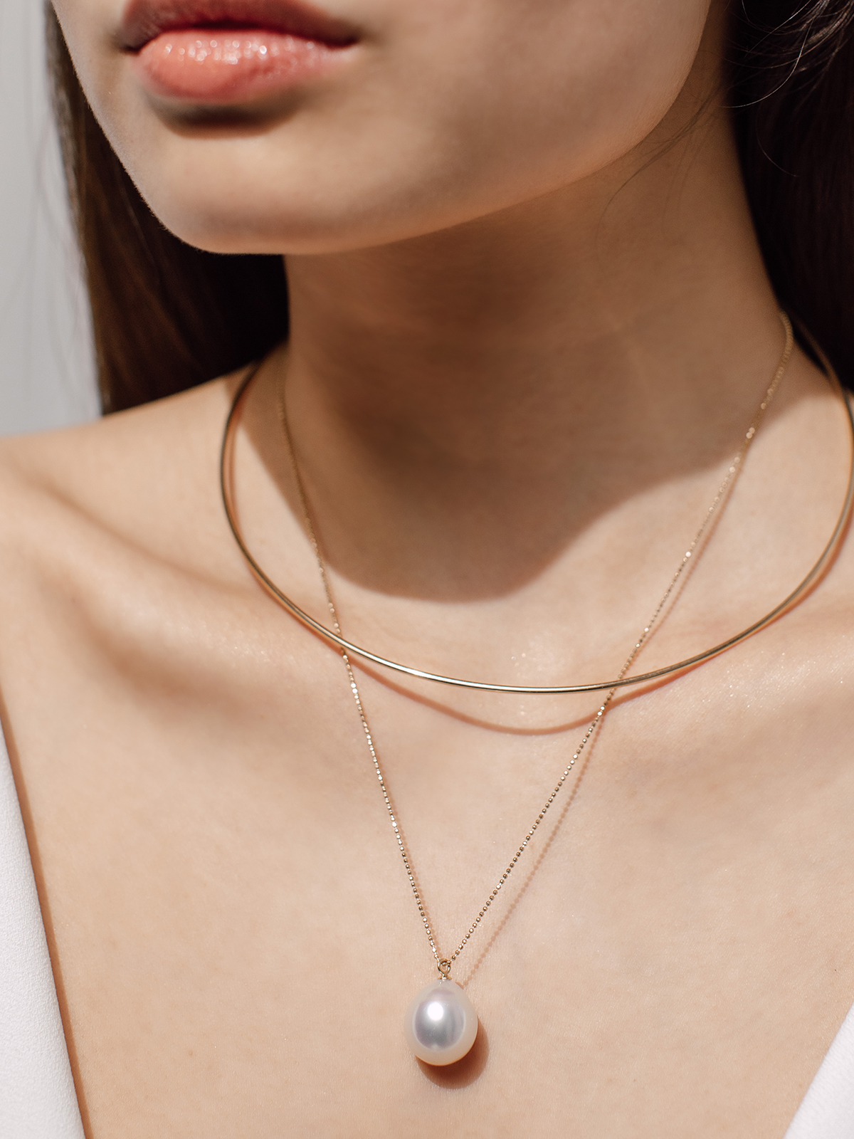 SD126-7c Perlencollier aus Gelbgold mit großer Südseeperle