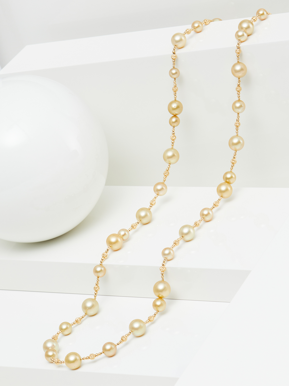 Luxurious long necklace with golden South Sea pearls
