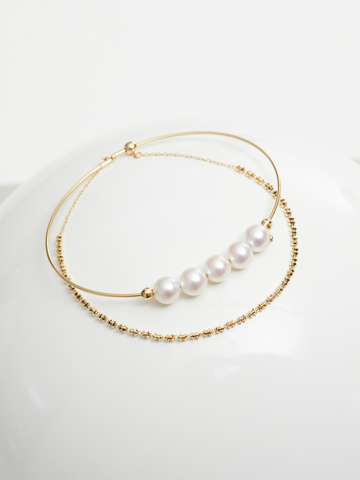 Doppelreihiges Perlenarmband aus Gold