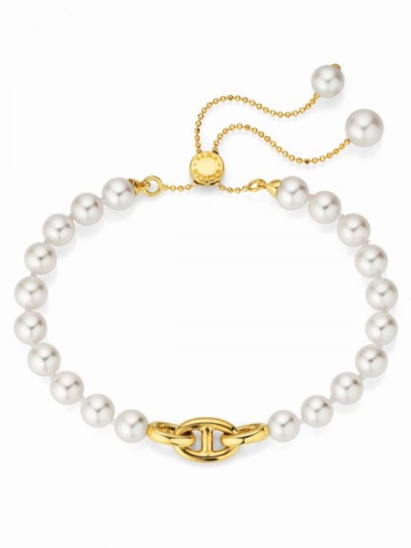 Akoya pearl bracelet with slide closure and anchor chain link detail in yellow gold